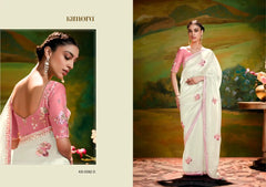 KIMORA Organza Saree Is A Masterful Blend Of Delicate Embroidery And Intricate Sequence Cutwork Along Its Border