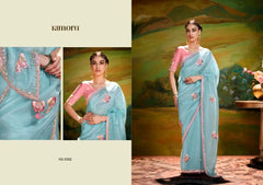 KIMORA Organza Saree Is A Masterful Blend Of Delicate Embroidery And Intricate Sequence Cutwork Along Its Border
