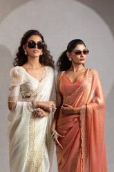 The Mehek Saree Showcases Exquisite Satin Silk Fabric Adorned With Elegant Foil