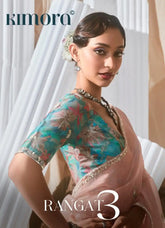 KIMORA Saree Features Luxurious Fancy Fabric Enhanced With Exquisite Designer Lace Work