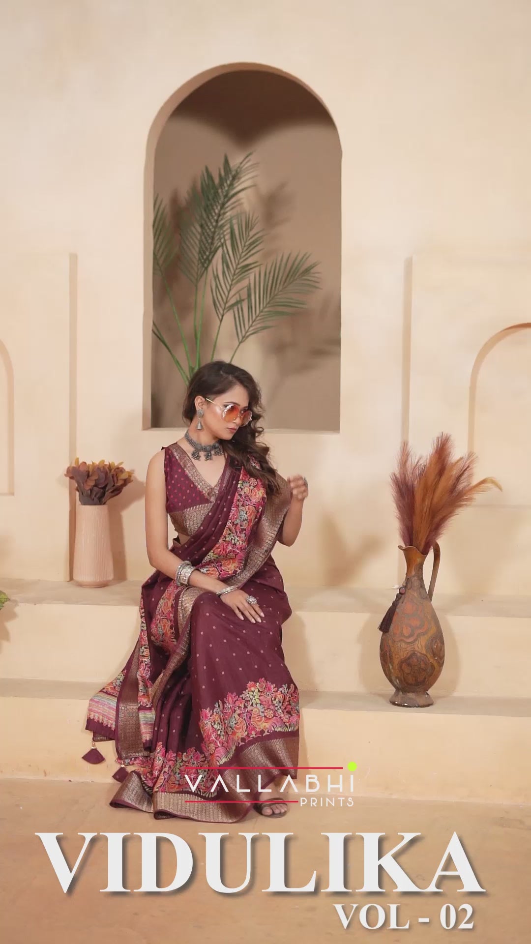 The Vallabhi Print Collection features sarees made from premium Dola Silk fabric, adorned with exquisite ethnic prints