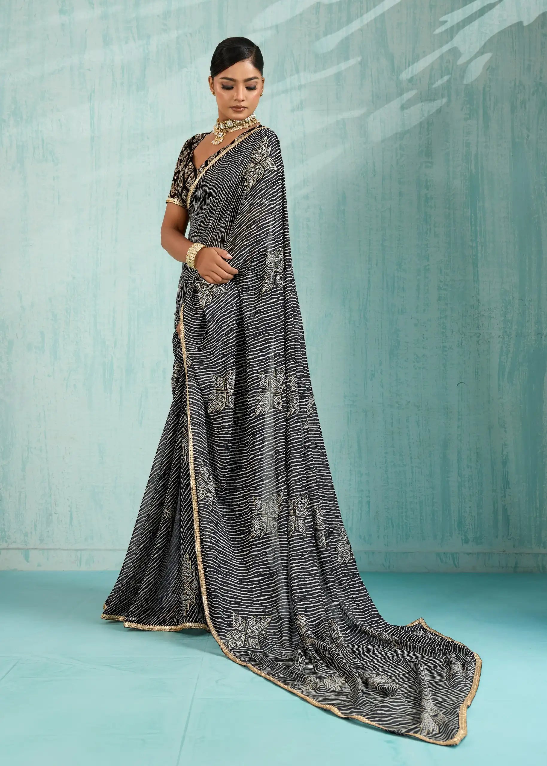 Stavan Sareesc Feature Premium Pure Chiffon Fabric Enhanced With Delicate Foil Work