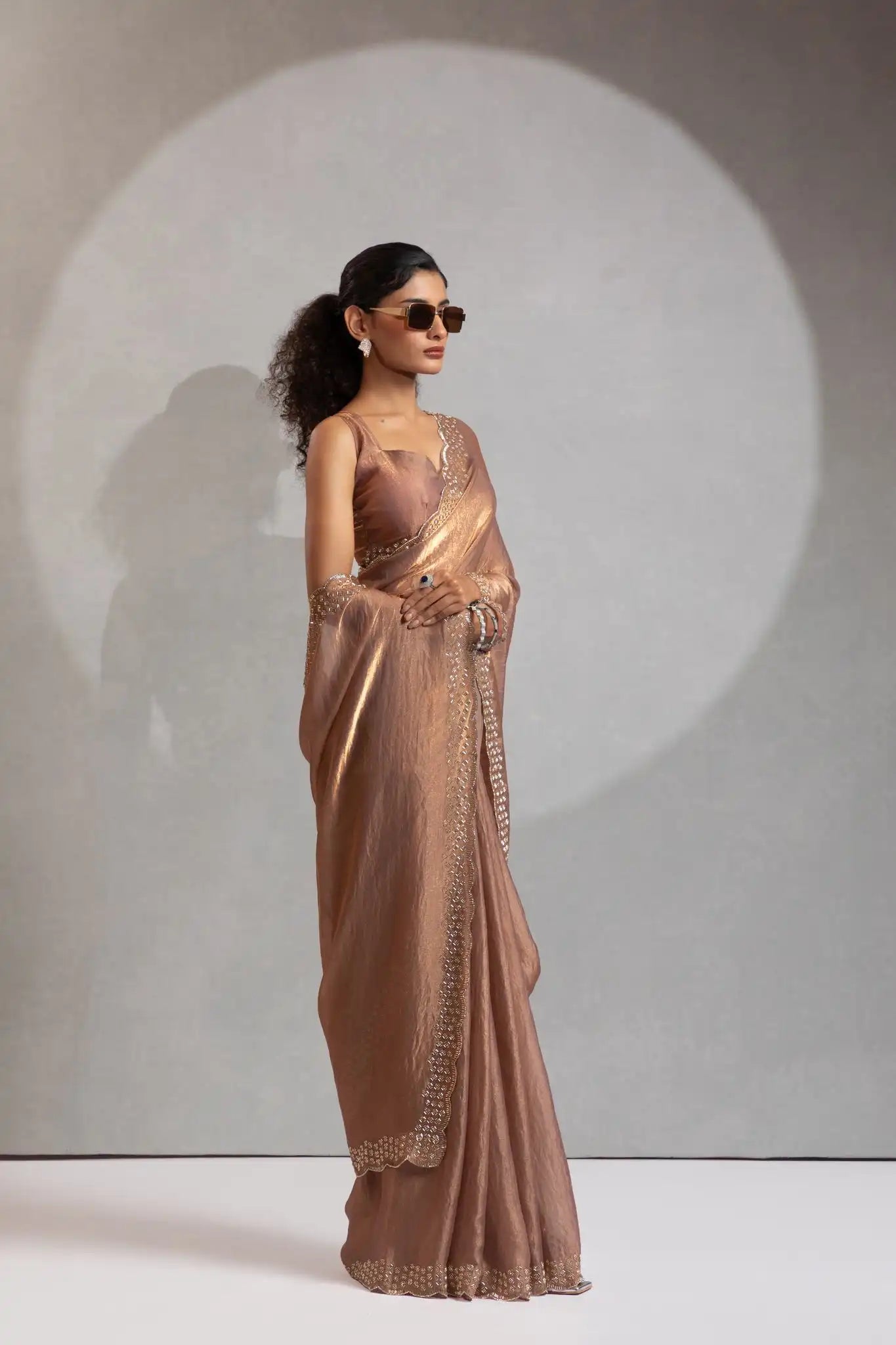 The Mehek Saree Showcases Exquisite Satin Silk Fabric Adorned With Elegant Foil