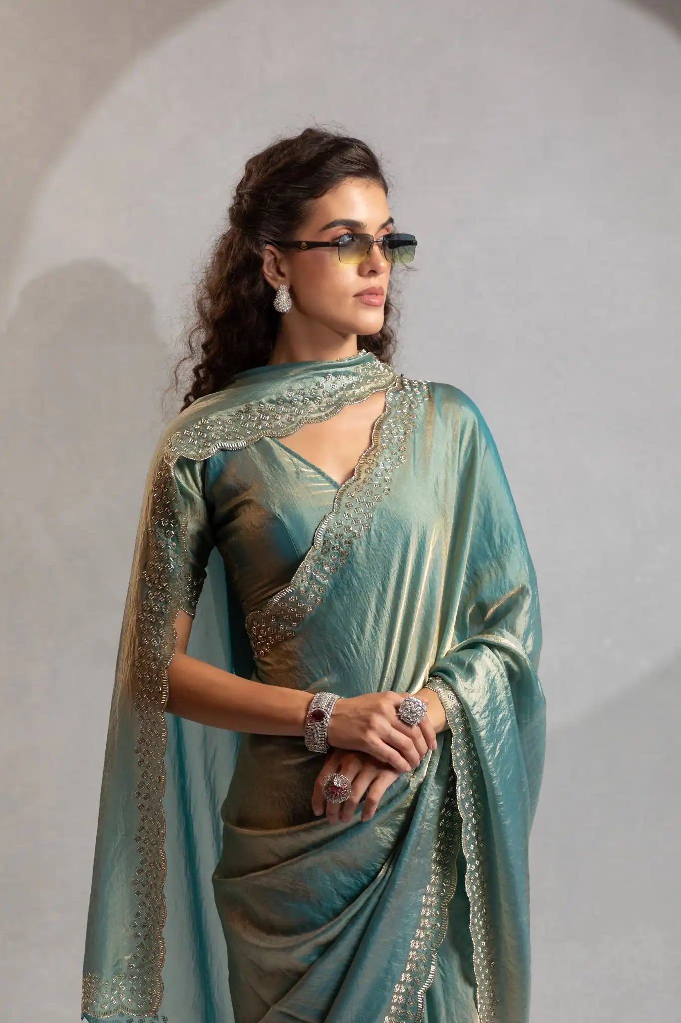 The Mehek Saree Showcases Exquisite Satin Silk Fabric Adorned With Elegant Foil