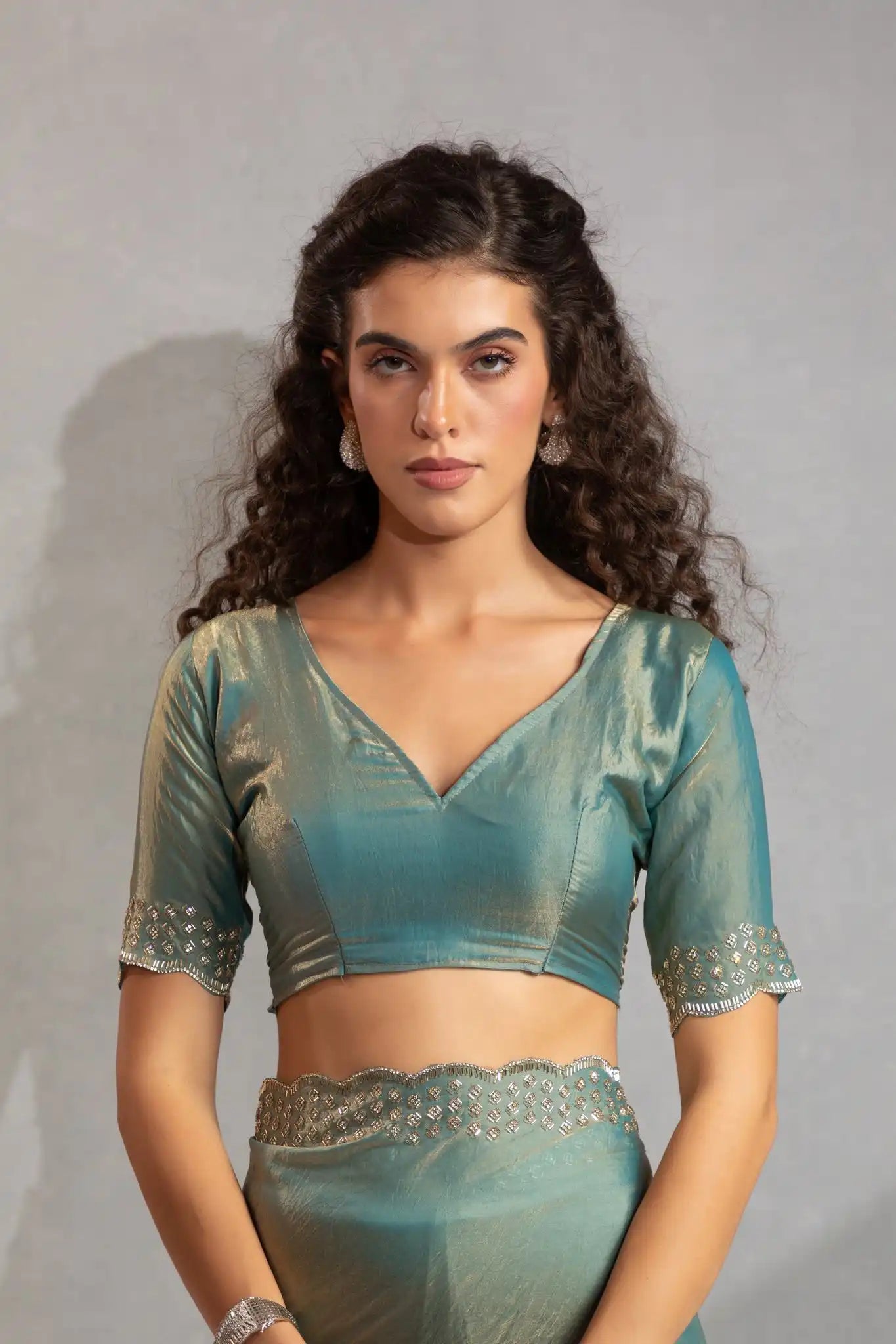 The Mehek Saree Showcases Exquisite Satin Silk Fabric Adorned With Elegant Foil