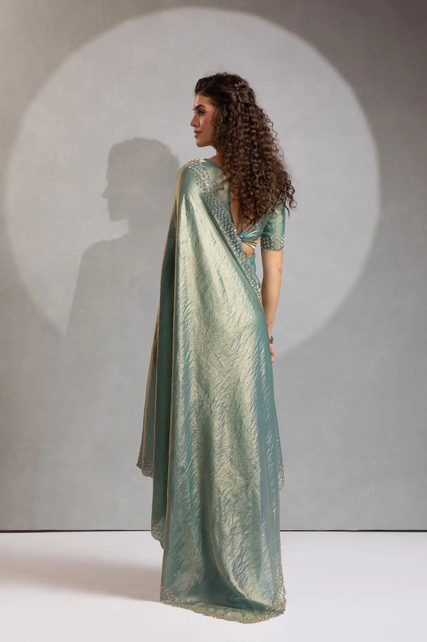 The Mehek Saree Showcases Exquisite Satin Silk Fabric Adorned With Elegant Foil