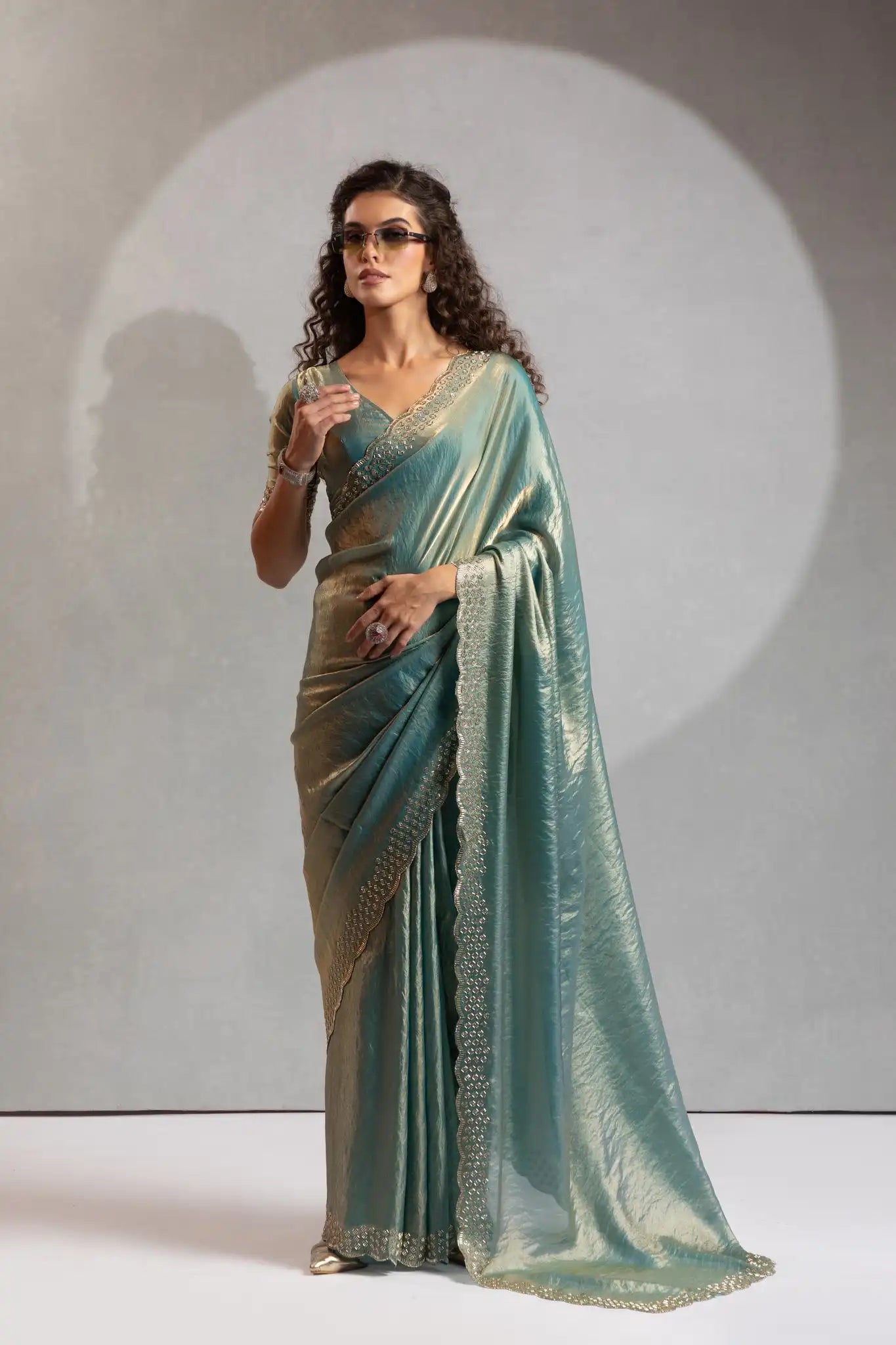 The Mehek Saree Showcases Exquisite Satin Silk Fabric Adorned With Elegant Foil