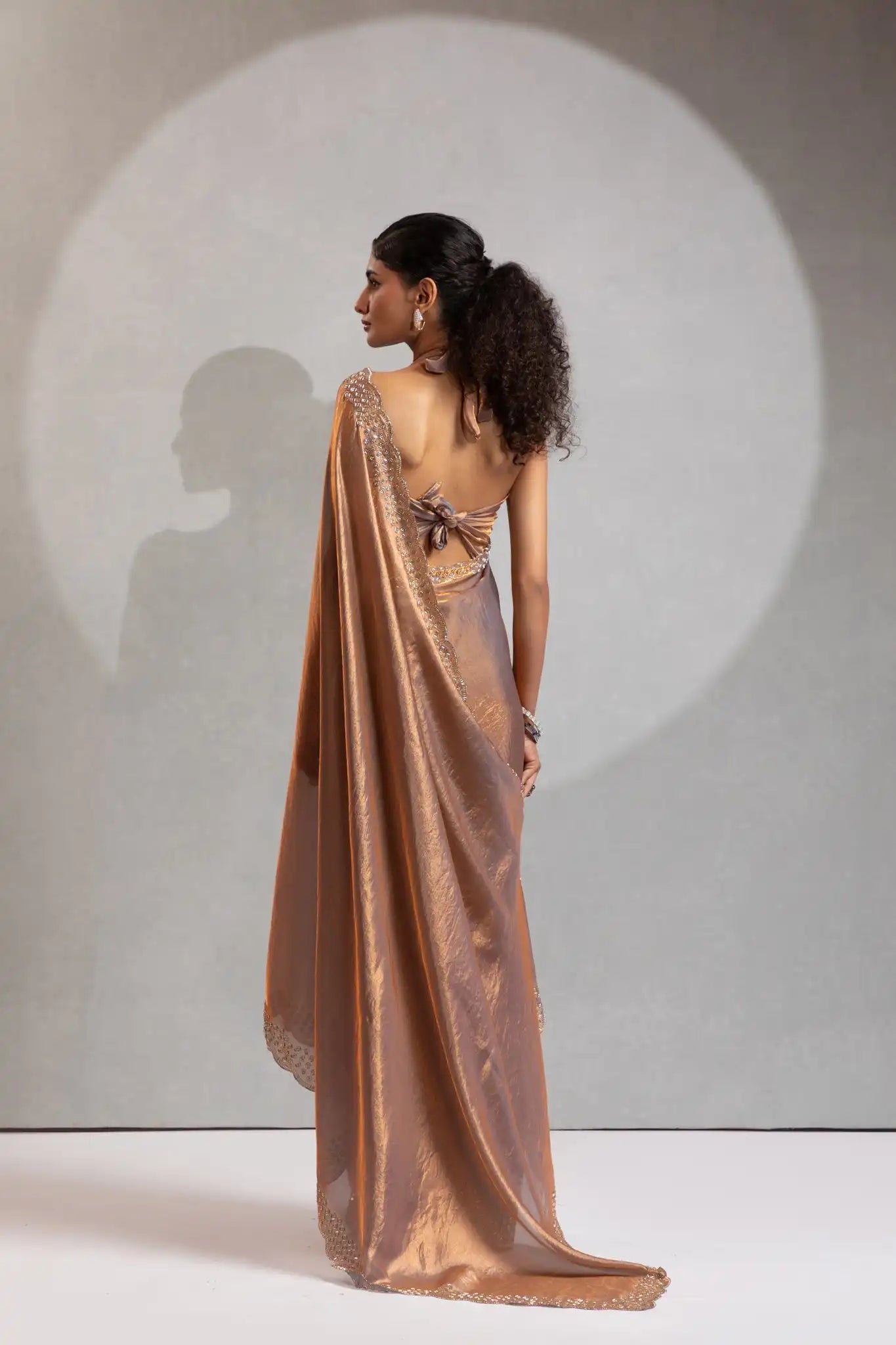 The Mehek Saree Showcases Exquisite Satin Silk Fabric Adorned With Elegant Foil