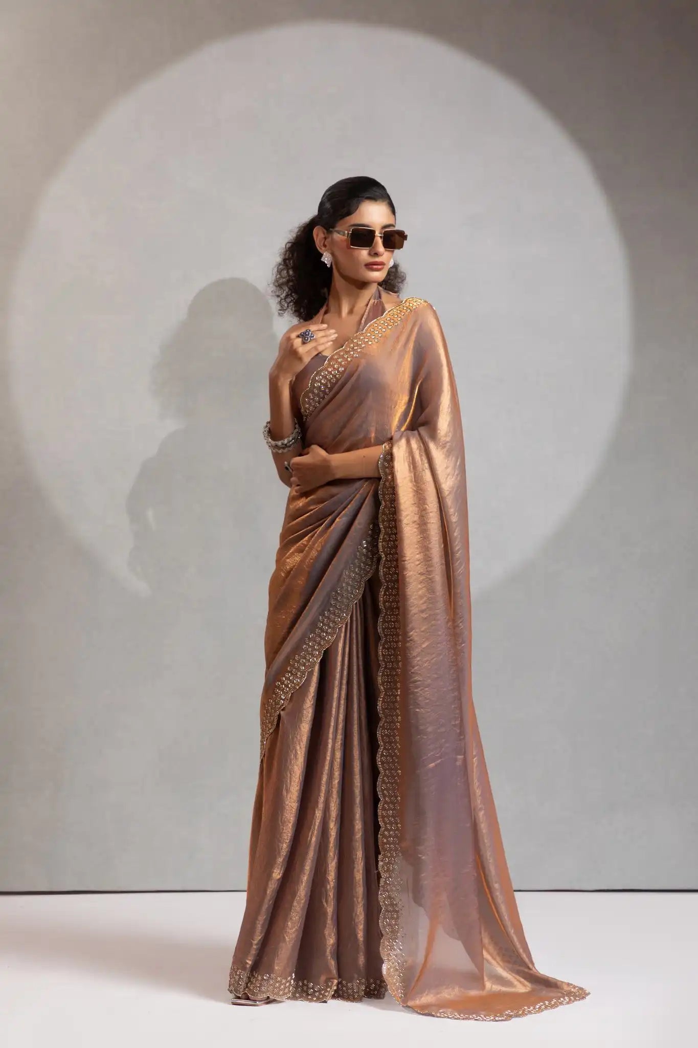 The Mehek Saree Showcases Exquisite Satin Silk Fabric Adorned With Elegant Foil