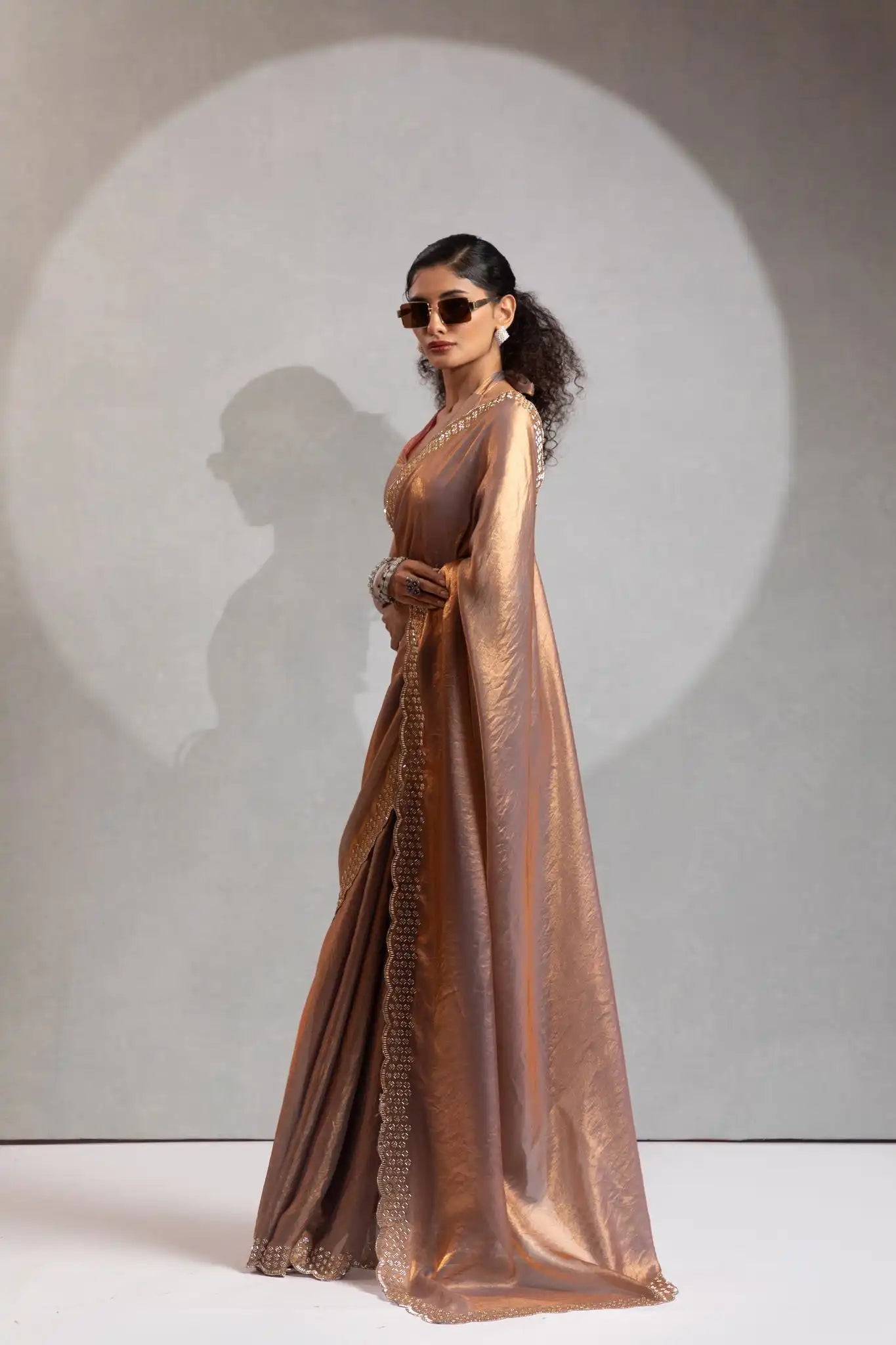 The Mehek Saree Showcases Exquisite Satin Silk Fabric Adorned With Elegant Foil