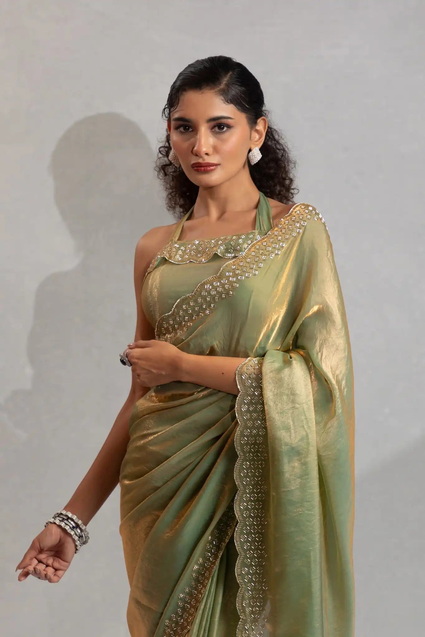The Mehek Saree Showcases Exquisite Satin Silk Fabric Adorned With Elegant Foil