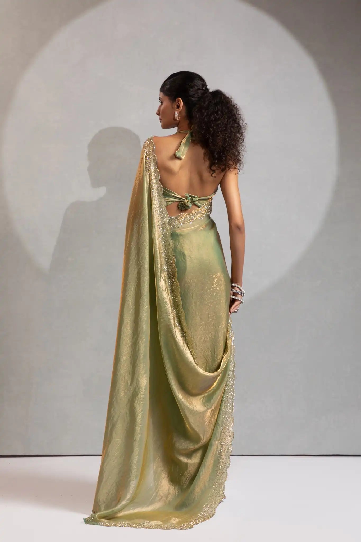 The Mehek Saree Showcases Exquisite Satin Silk Fabric Adorned With Elegant Foil
