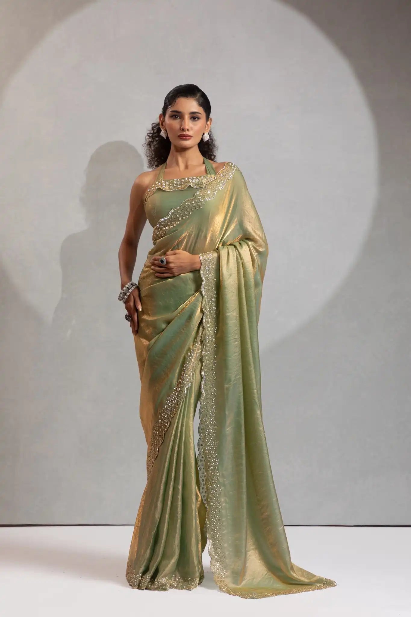 The Mehek Saree Showcases Exquisite Satin Silk Fabric Adorned With Elegant Foil