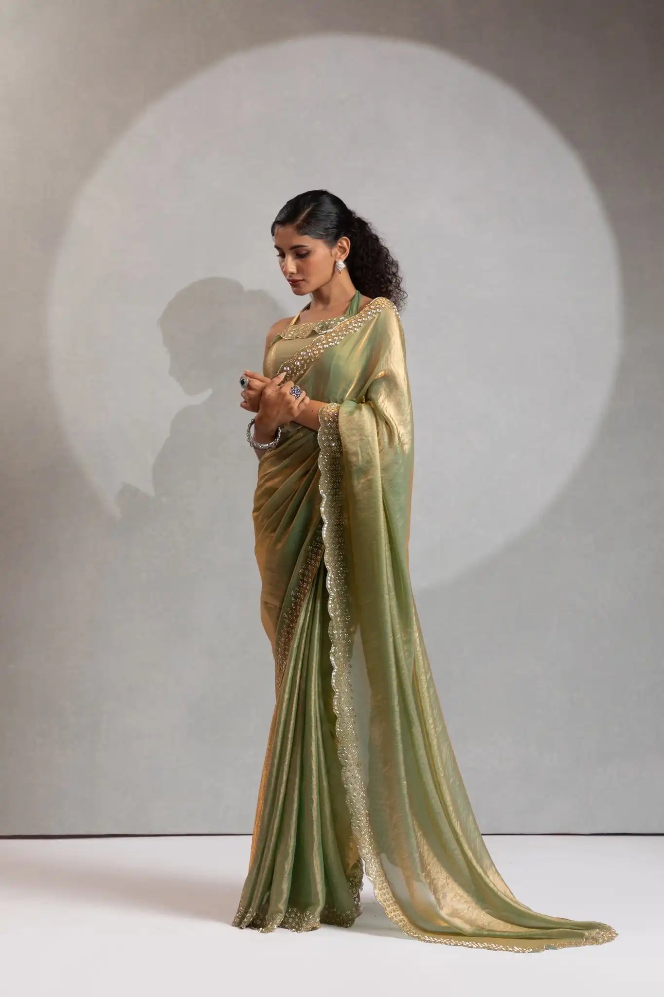 The Mehek Saree Showcases Exquisite Satin Silk Fabric Adorned With Elegant Foil