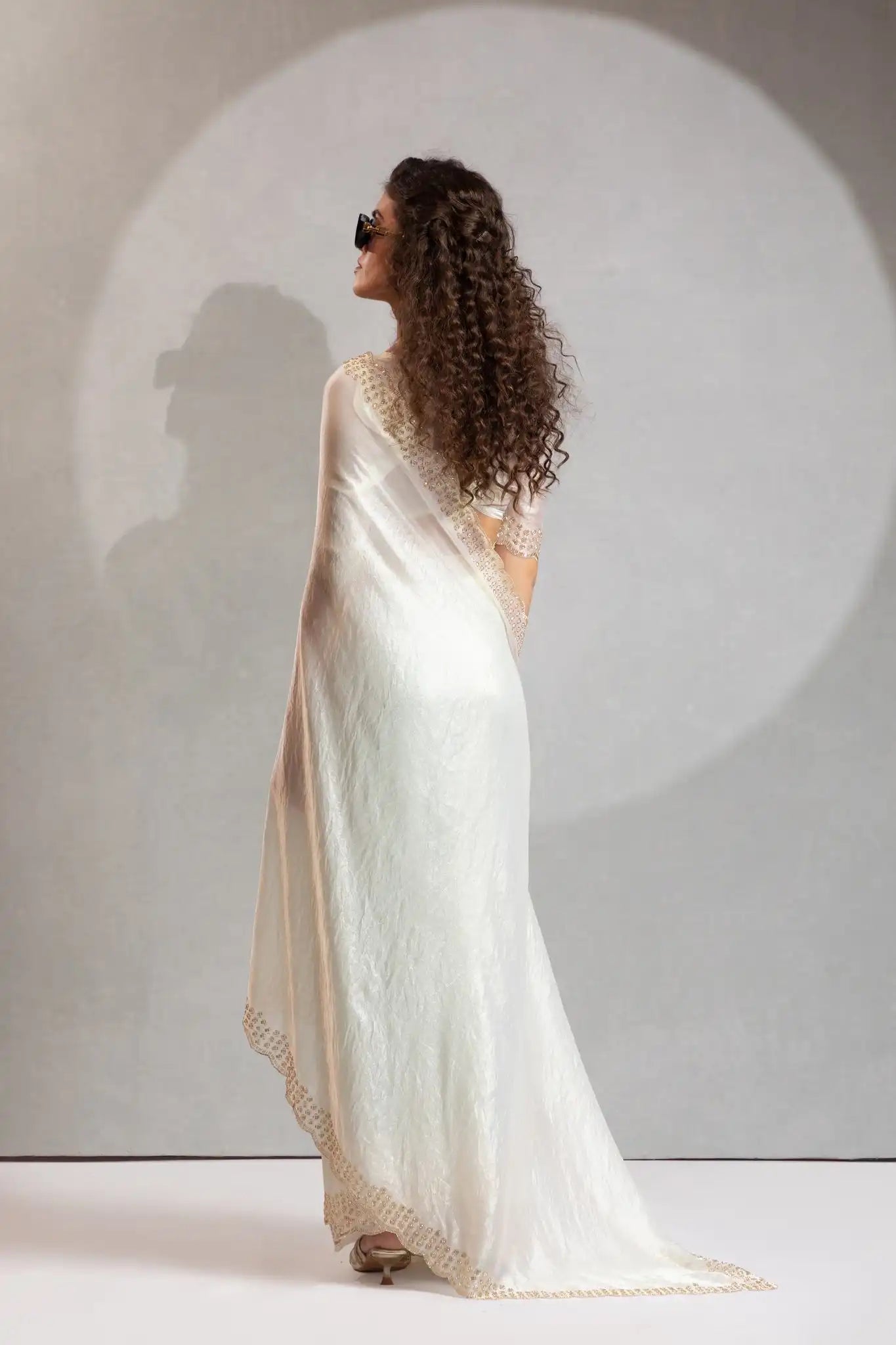 The Mehek Saree Showcases Exquisite Satin Silk Fabric Adorned With Elegant Foil
