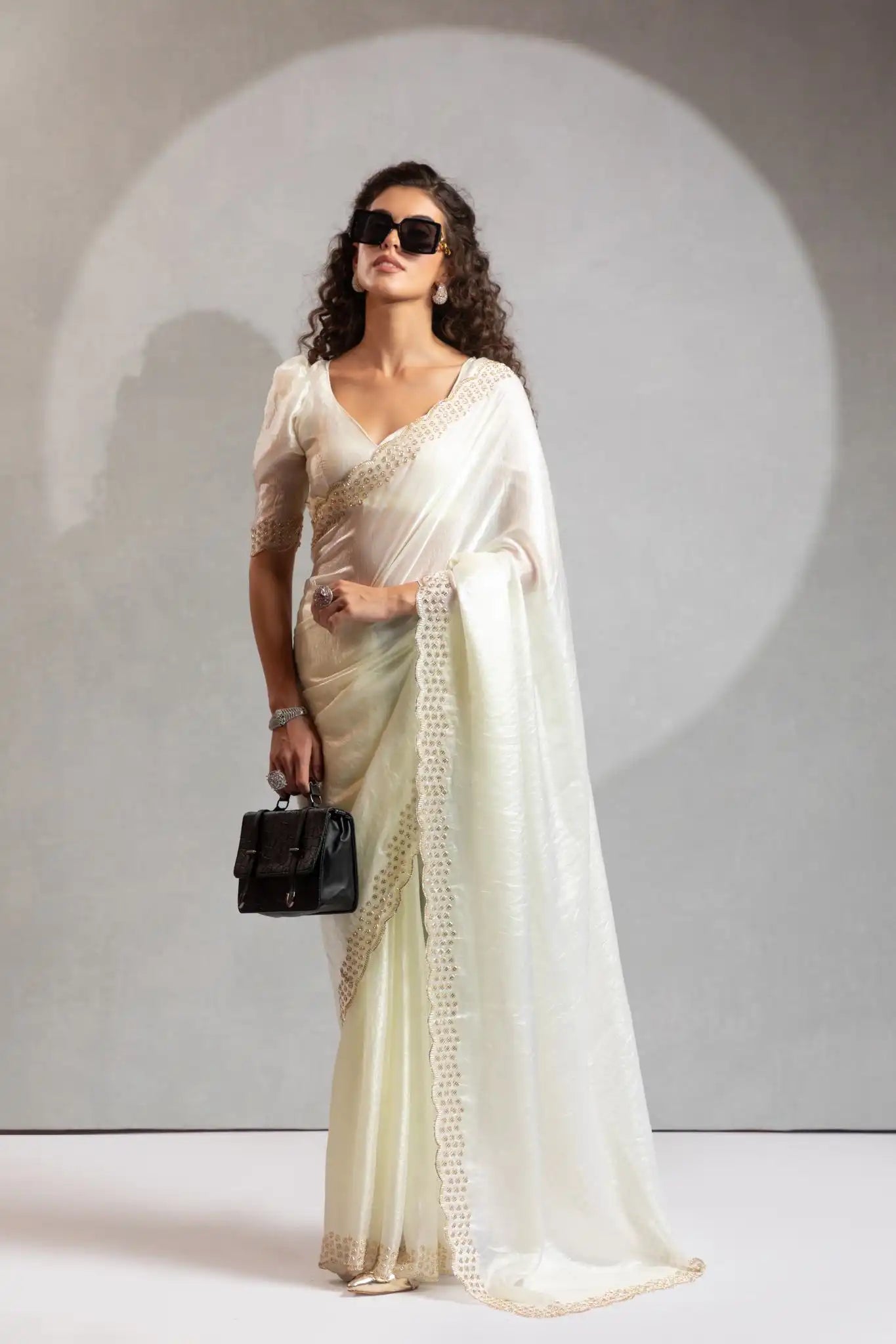 The Mehek Saree Showcases Exquisite Satin Silk Fabric Adorned With Elegant Foil