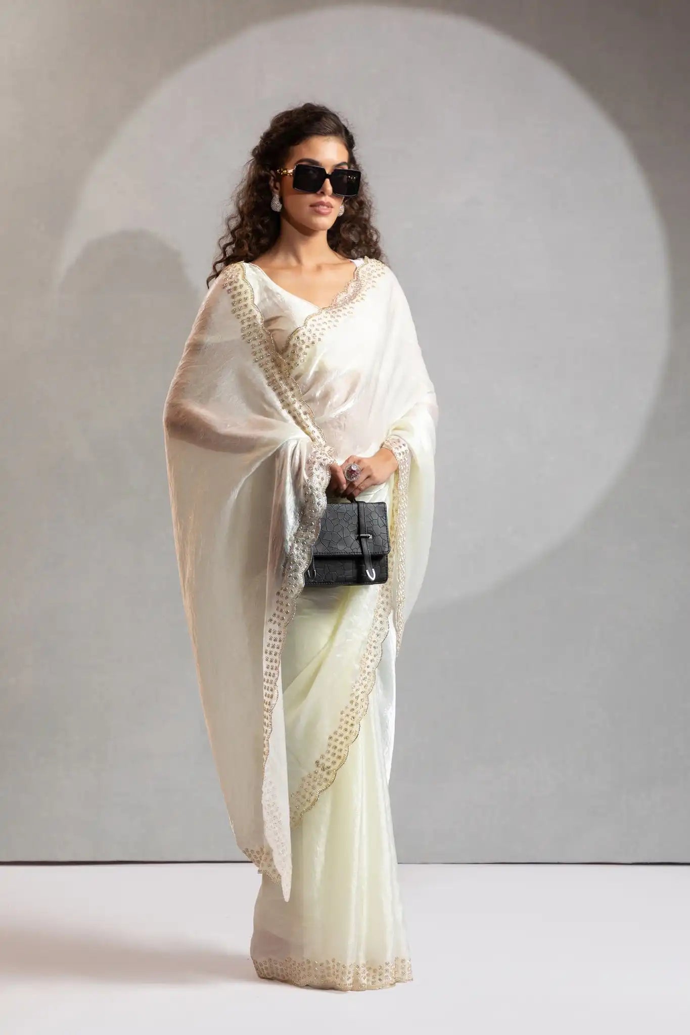 The Mehek Saree Showcases Exquisite Satin Silk Fabric Adorned With Elegant Foil