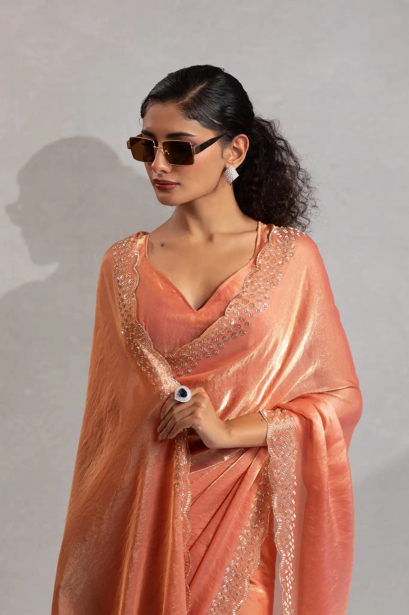 The Mehek Saree Showcases Exquisite Satin Silk Fabric Adorned With Elegant Foil