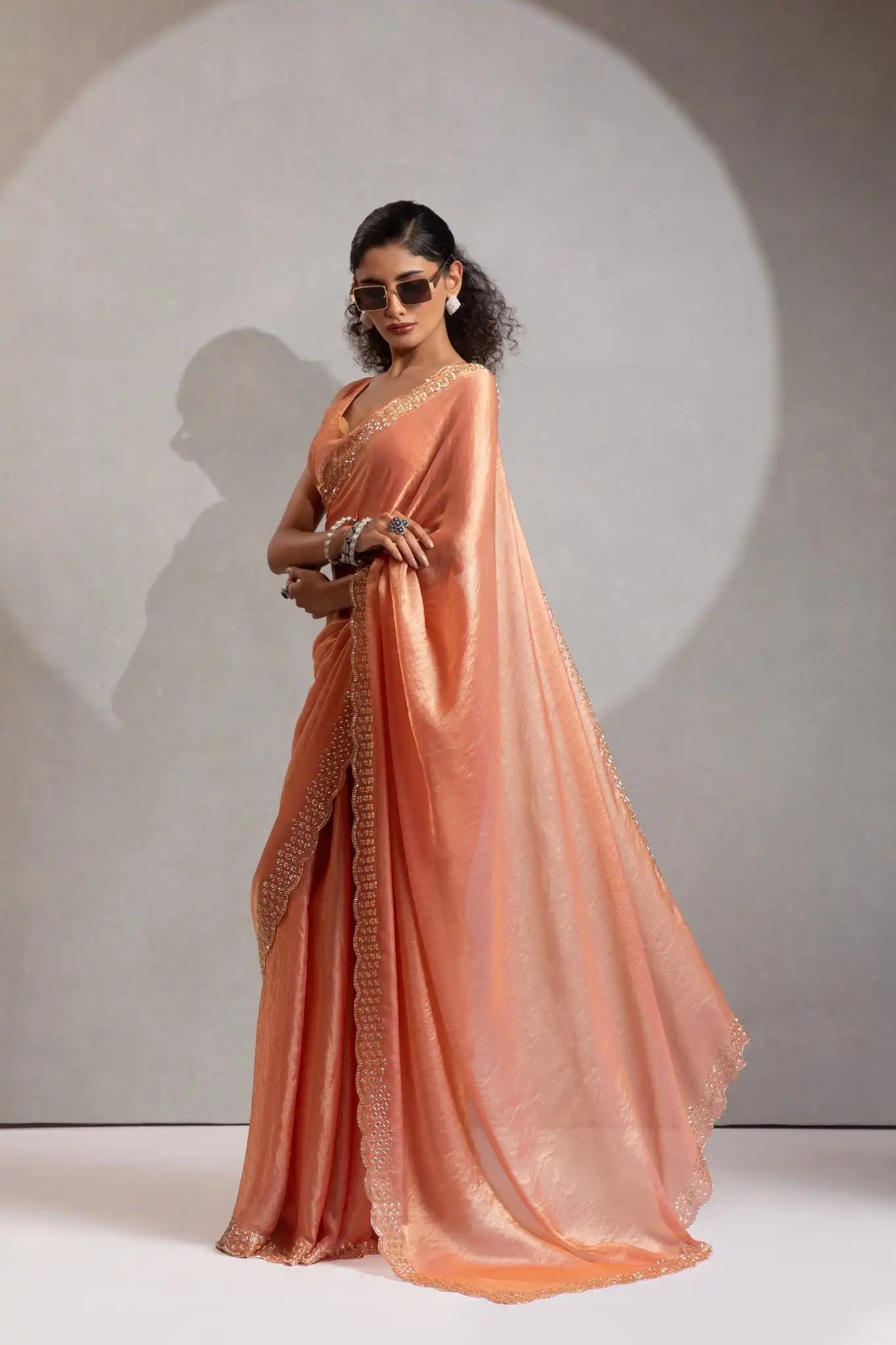 The Mehek Saree Showcases Exquisite Satin Silk Fabric Adorned With Elegant Foil