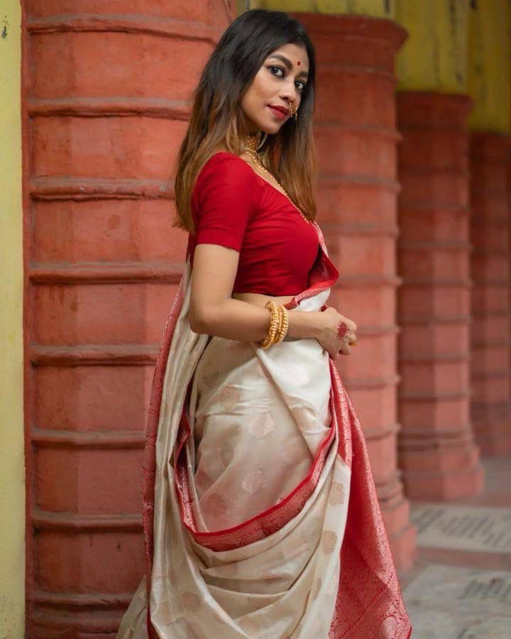 Kasturi Trendz Elegant White and Red Embroidered Saree – Traditional and Graceful