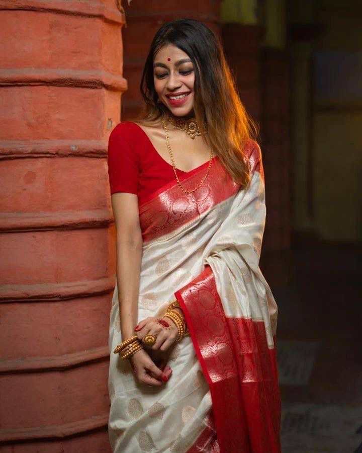 Kasturi Trendz Elegant White and Red Embroidered Saree – Traditional and Graceful