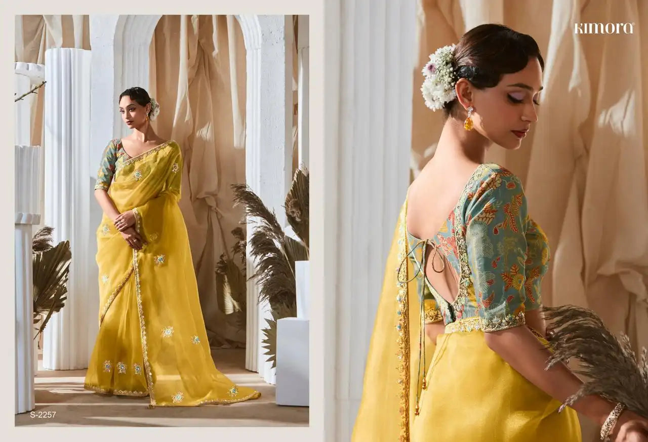 KIMORA Saree Features Luxurious Fancy Fabric Enhanced With Exquisite Designer Lace Work