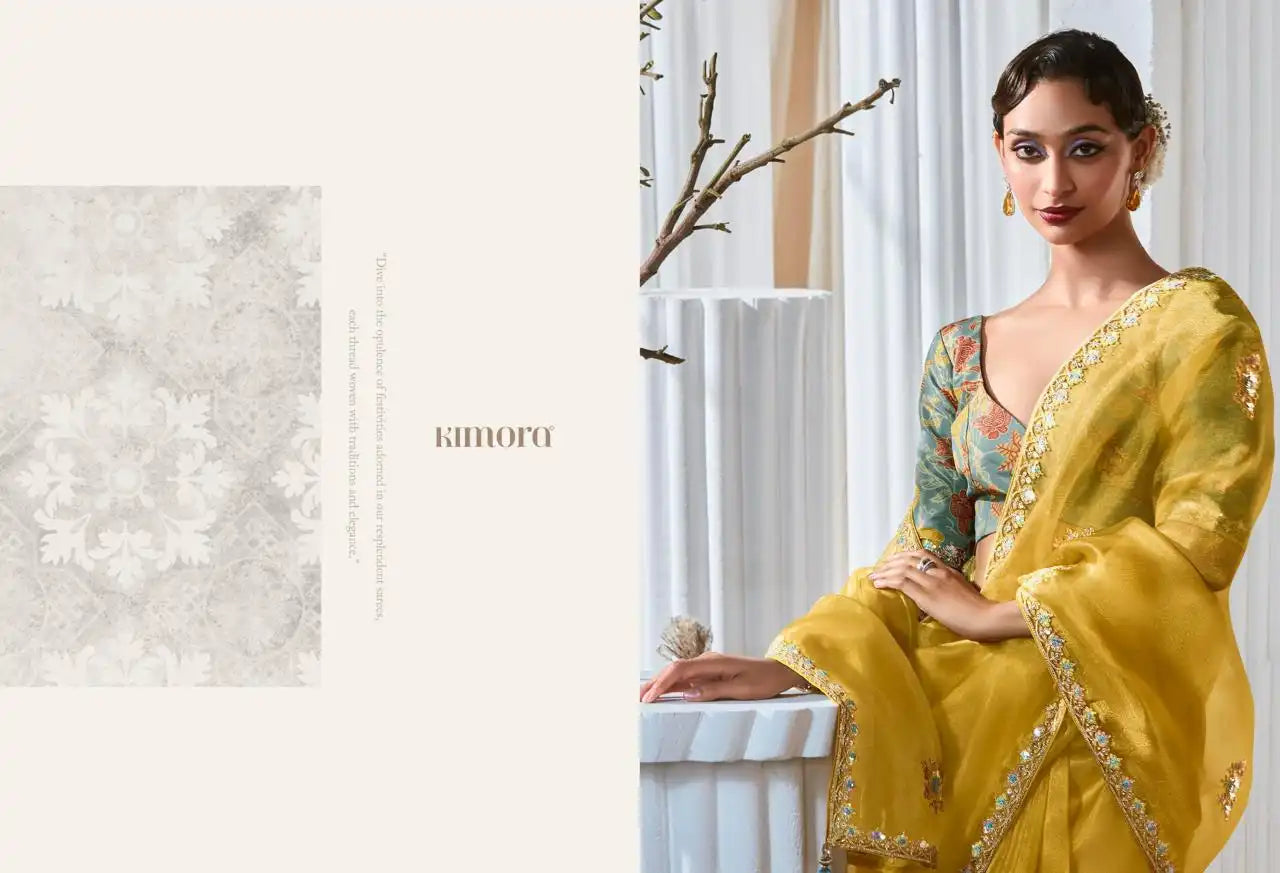 KIMORA Saree Features Luxurious Fancy Fabric Enhanced With Exquisite Designer Lace Work