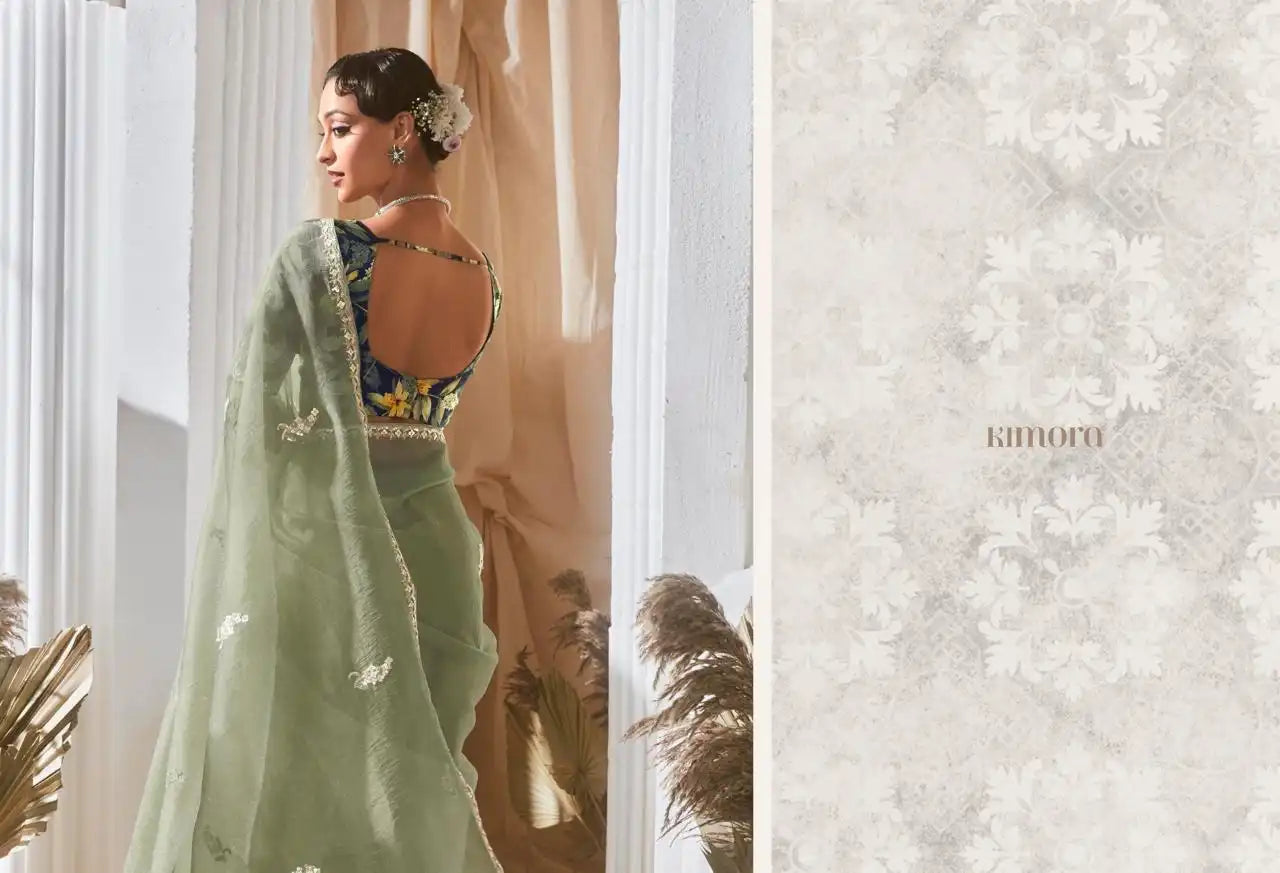 KIMORA Saree Features Luxurious Fancy Fabric Enhanced With Exquisite Designer Lace Work