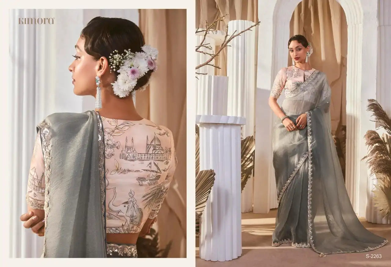 KIMORA Saree Features Luxurious Fancy Fabric Enhanced With Exquisite Designer Lace Work