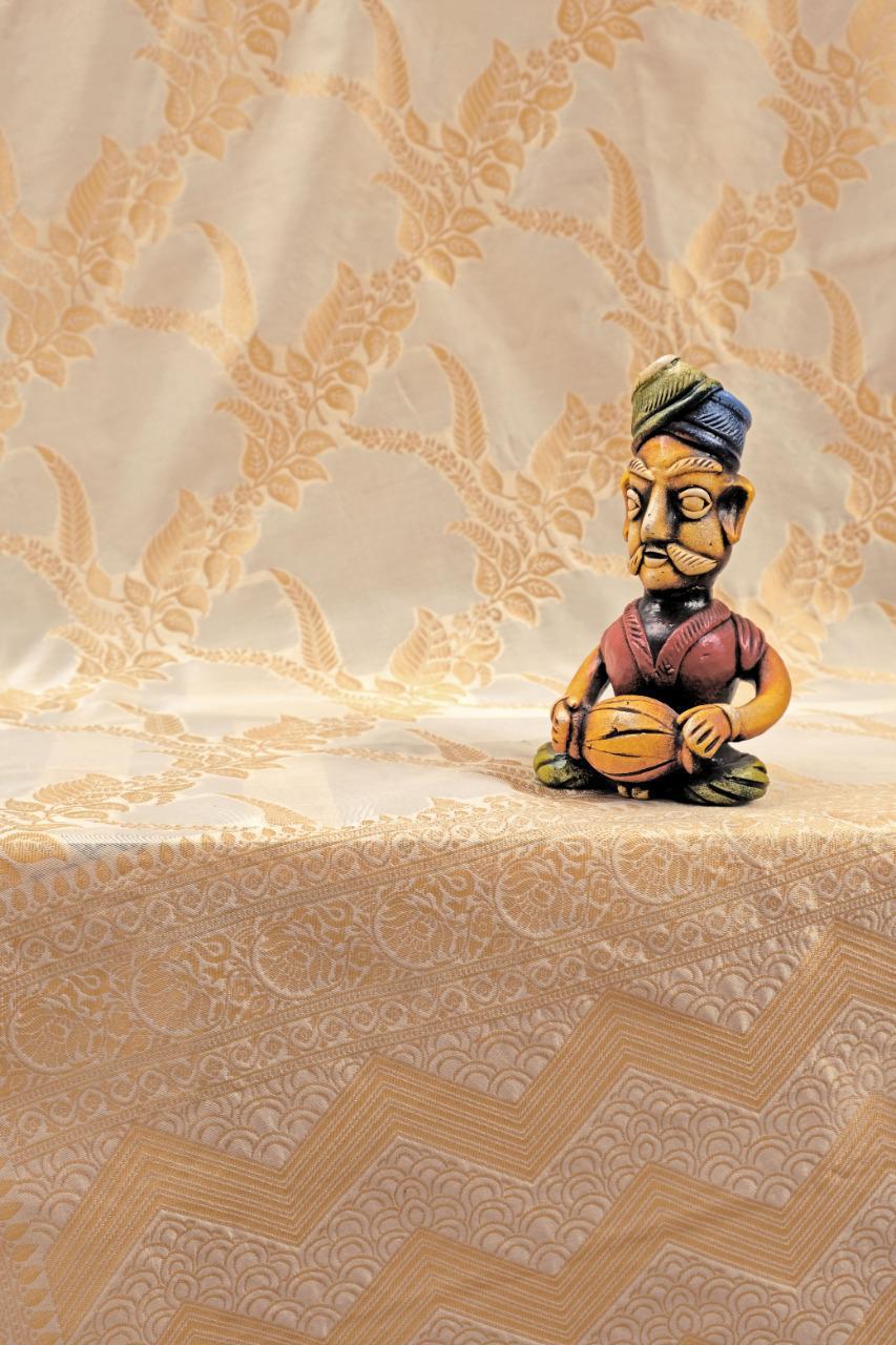 KP CREATION Elegant Cream Silk Saree with Intricate Gold Prints and Traditional Styling