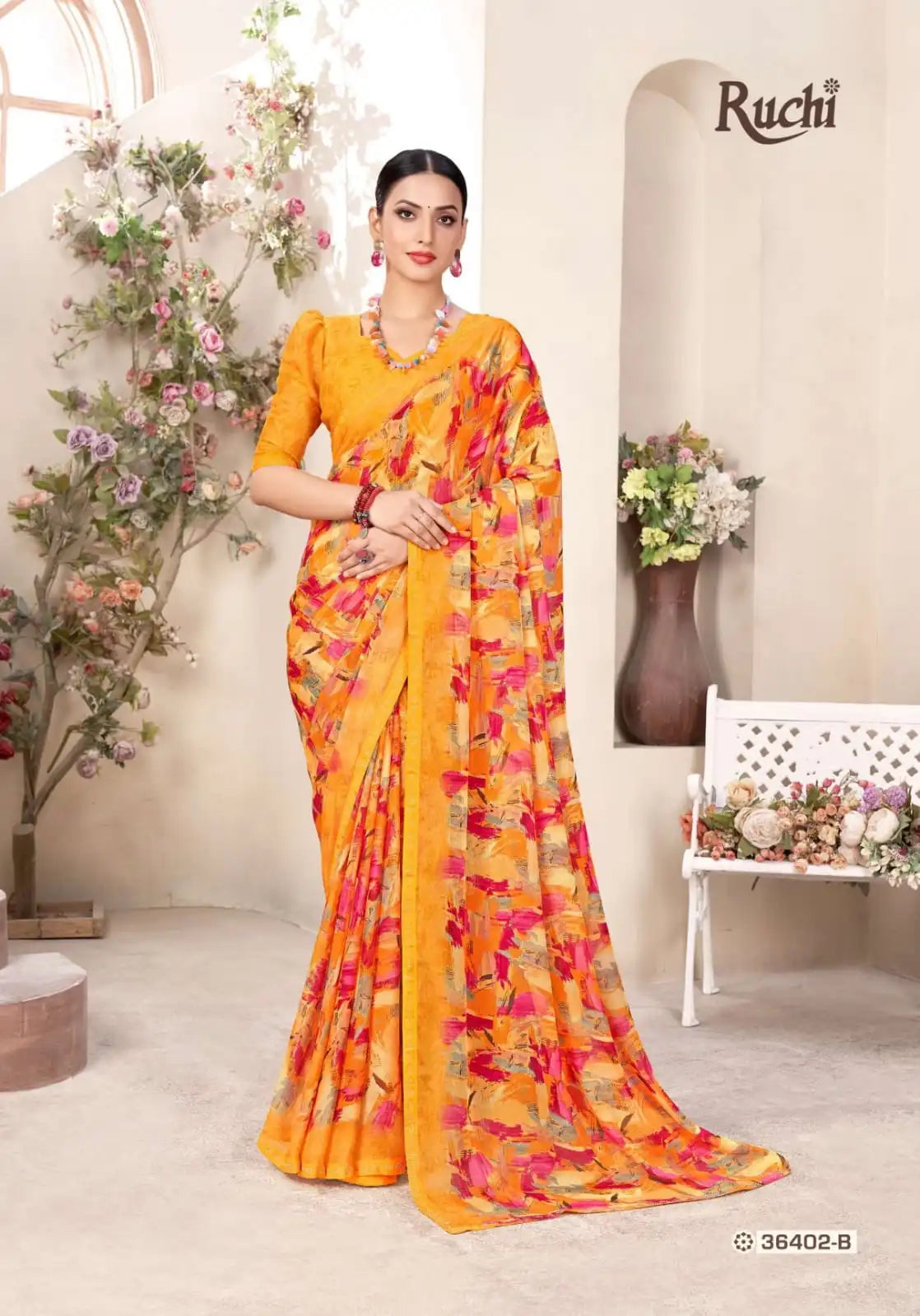 Ruchi Chiffon Saree Featuring A Delicate Swarovski Crystal Border That Adds A Subtle Sparkle