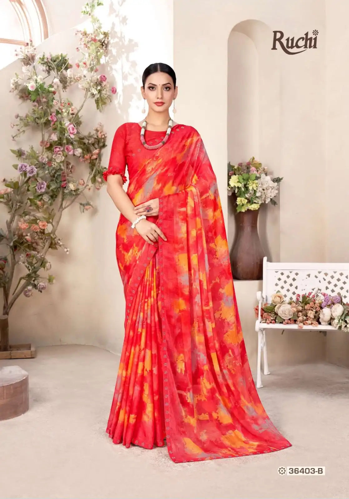 Ruchi Chiffon Saree Featuring A Delicate Swarovski Crystal Border That Adds A Subtle Sparkle