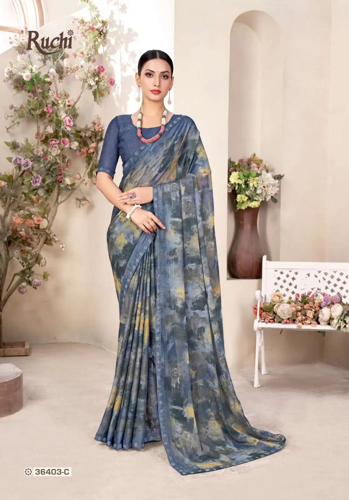 Ruchi Chiffon Saree Featuring A Delicate Swarovski Crystal Border That Adds A Subtle Sparkle