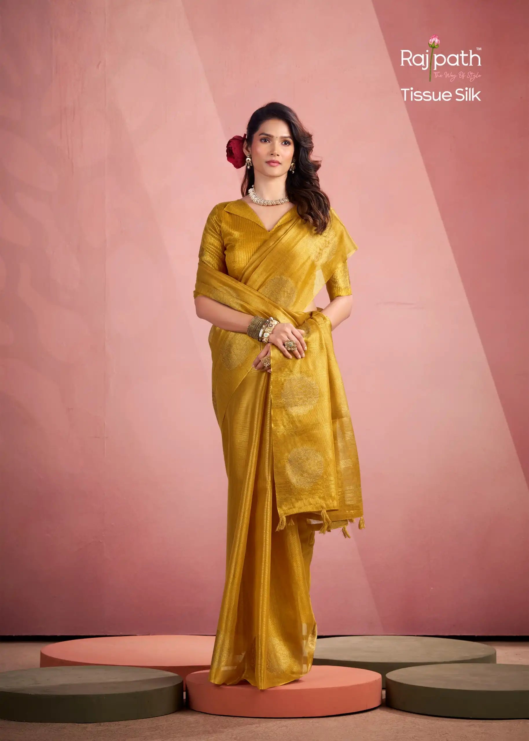 Rajpath Fabrics presents tissue Fancy Weaving Sarees Expertly Crafted To Combine Traditional