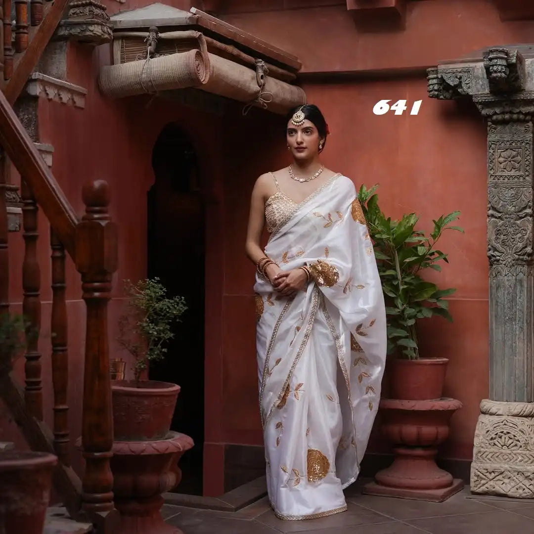 JR Sarees Are Crafted From Premium Rangoli Silk Fabric Enhanced With Delicate Sequence Embroider