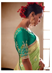 Kimora Saree Are Highly Crafted With Pure Dola Silk To Offer Luxrious Drape With Vibrant Color