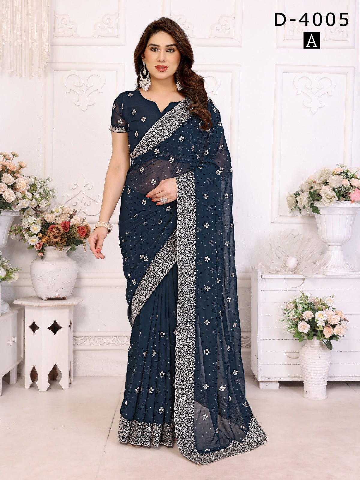 Jay Shree Sarees Feature Luxurious Georgette Fabric Adorned With Detailed Zari And Stone Work