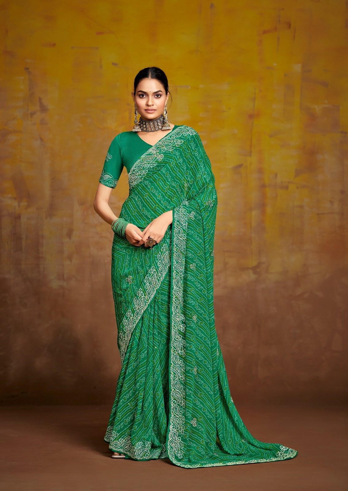 Stavan Sarees Are Crafted With Georgette Pallu With Embroidery And Sparkling Work