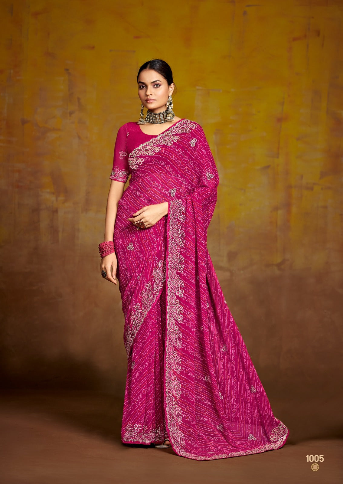 Stavan Sarees Are Crafted With Georgette Pallu With Embroidery And Sparkling Work