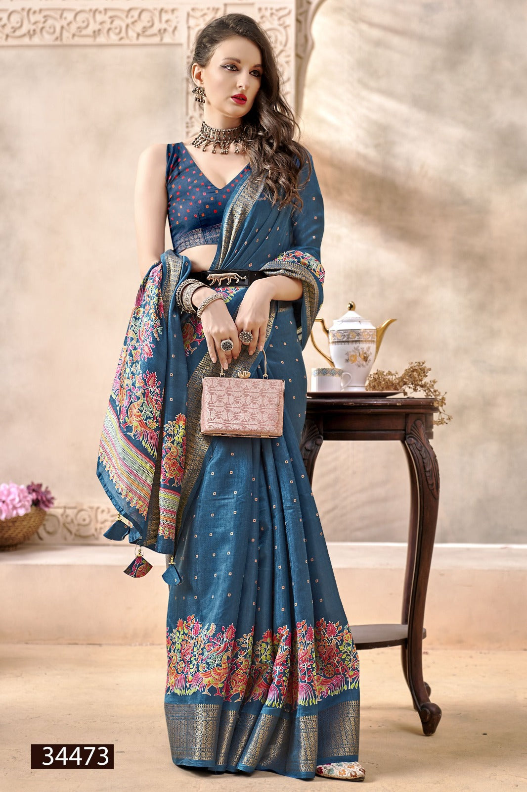 The Vallabhi Print Collection features sarees made from premium Dola Silk fabric, adorned with exquisite ethnic prints
