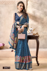 The Vallabhi Print Collection features sarees made from premium Dola Silk fabric, adorned with exquisite ethnic prints
