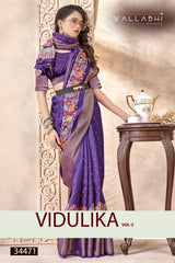 The Vallabhi Print Collection features sarees made from premium Dola Silk fabric, adorned with exquisite ethnic prints