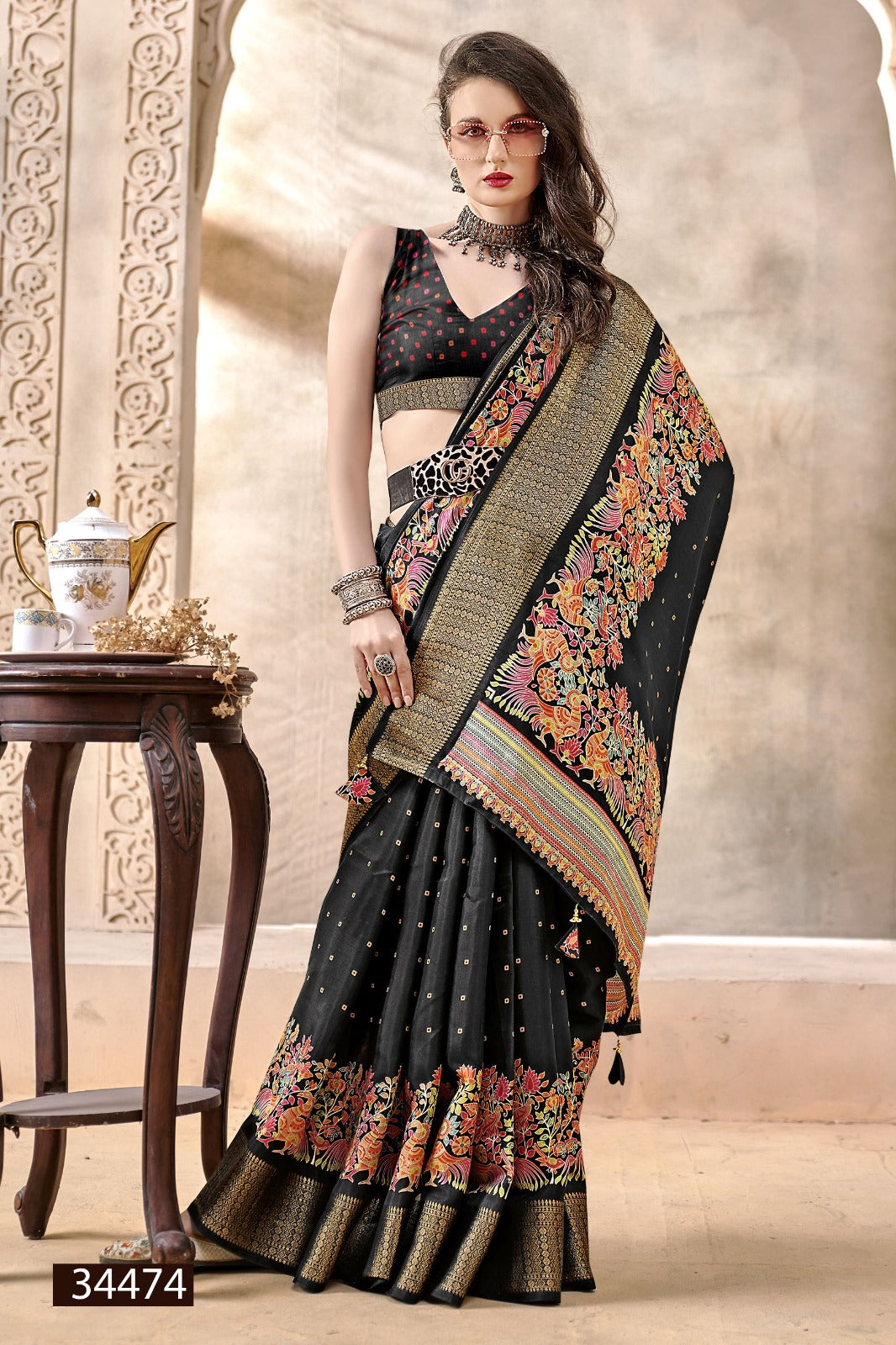 The Vallabhi Print Collection features sarees made from premium Dola Silk fabric, adorned with exquisite ethnic prints