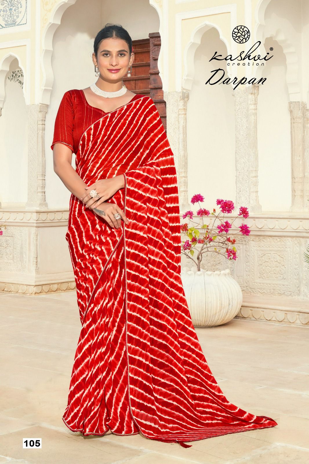 The Kashvi Creation Saree showcases a beautiful georgette fabric with traditional Lehariya patterns