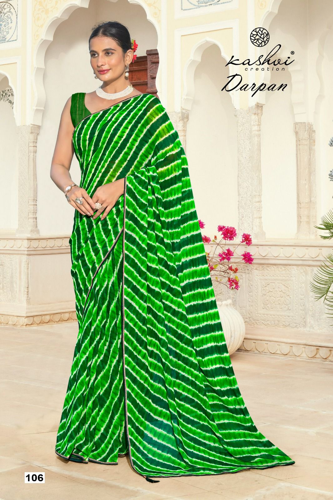 The Kashvi Creation Saree showcases a beautiful georgette fabric with traditional Lehariya patterns