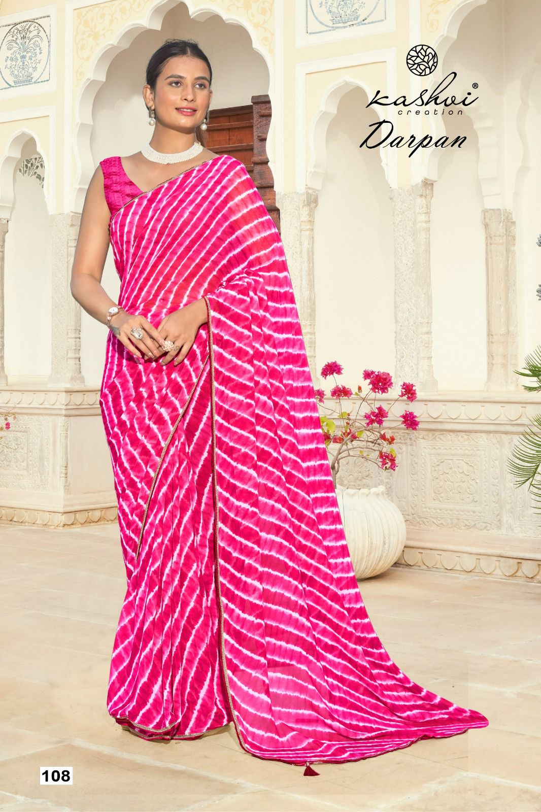 The Kashvi Creation Saree showcases a beautiful georgette fabric with traditional Lehariya patterns