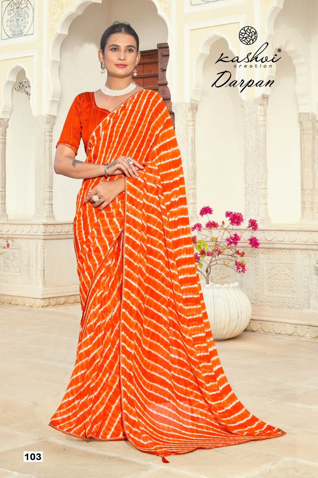 The Kashvi Creation Saree showcases a beautiful georgette fabric with traditional Lehariya patterns