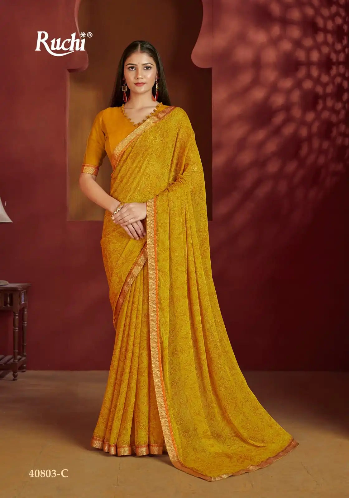 The Ruchi Chiffon Saree With An Attached Border Combines Delicate Fabric With Expert Tailoring