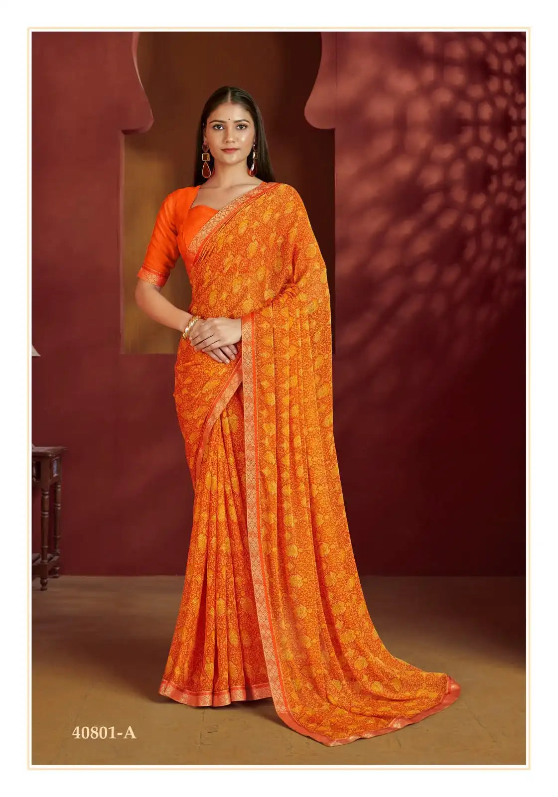 The Ruchi Chiffon Saree With An Attached Border Combines Delicate Fabric With Expert Tailoring