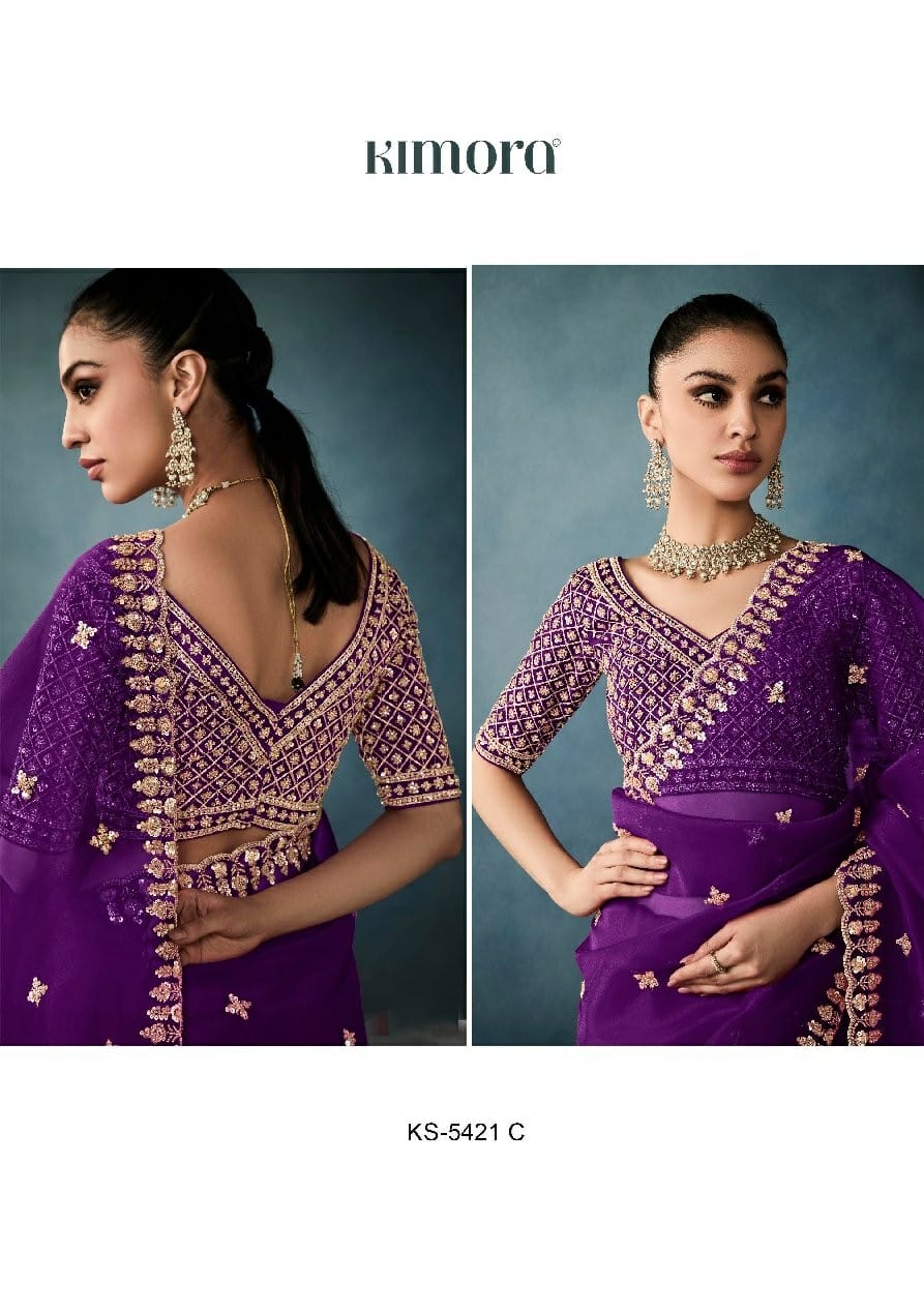 Kimora Sarees Feature Pure Fancy-Based Fabric That Offers A Luxurious Feel And Elegant Drape